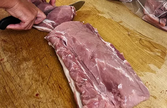 C Dawson & Sons Pork Loin being cut up